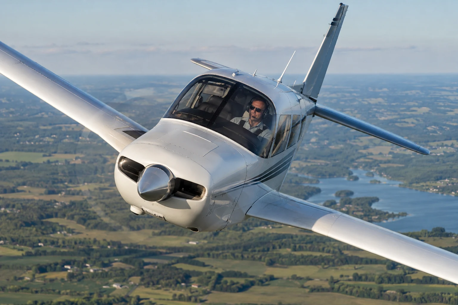 Featured illustration for Load Factor in Turns: Why Bank Angle Changes Stall Speed, showing a realistic aviation maneuver scenario