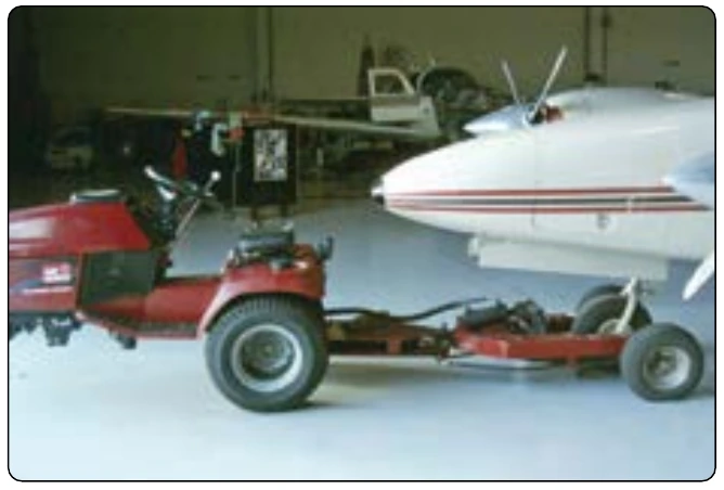 Figure 1-21. Typical smaller aircraft tow tractor.
