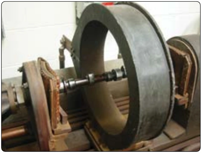 Figure 10-30. Longitudinal magnetization of camshaft (solenoid method).