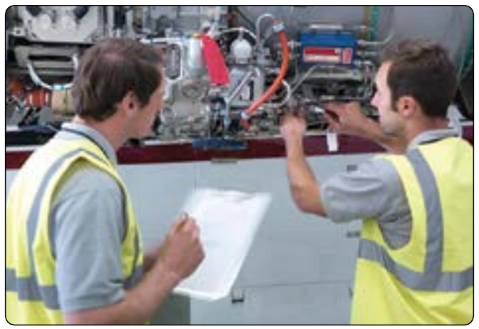 Figure 14-4. AMT documenting repair work.