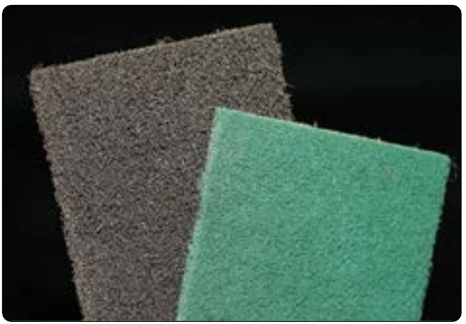 Figure 8-28. Nonwoven abrasive pads.