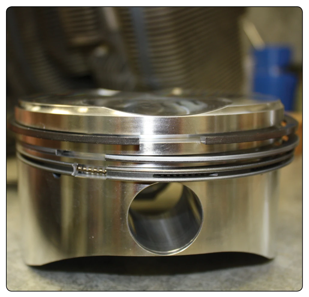 Machined rings around a piston.