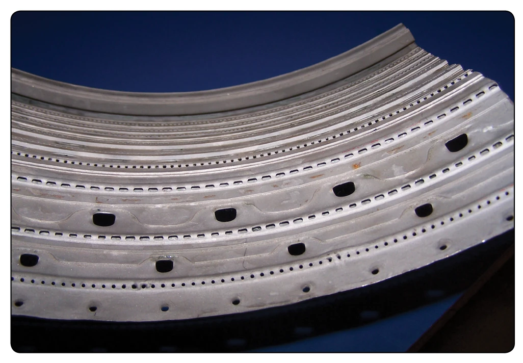 Combustion chamber louvers and holes.