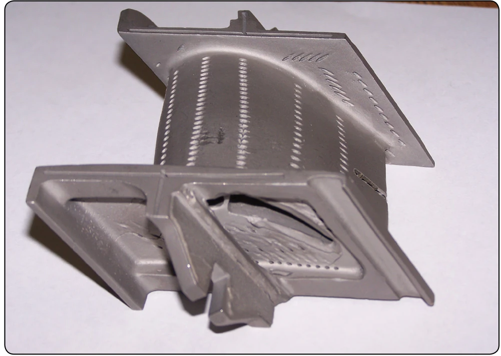 Turbine blade with cooling holes.