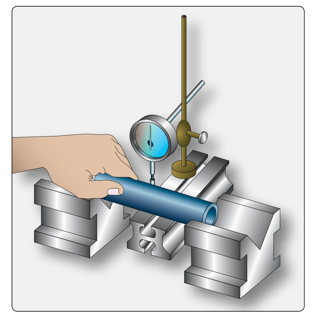 Checking a piston pin for bends.