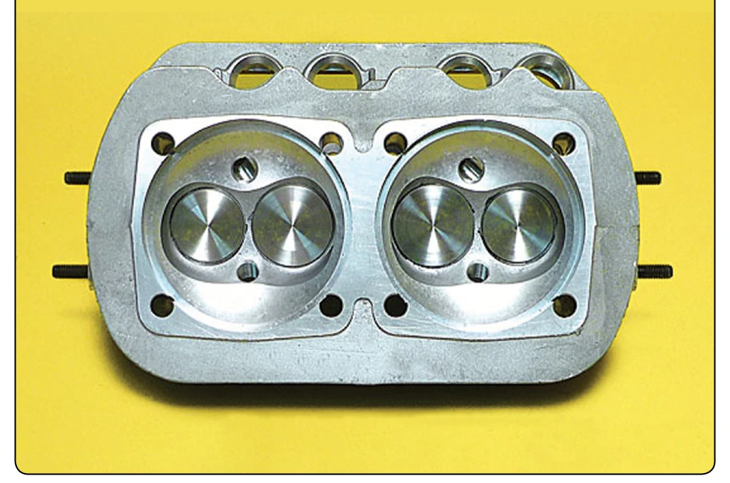 Hemispherical combustion chamber within the Revmaster R-2300 Heads.
