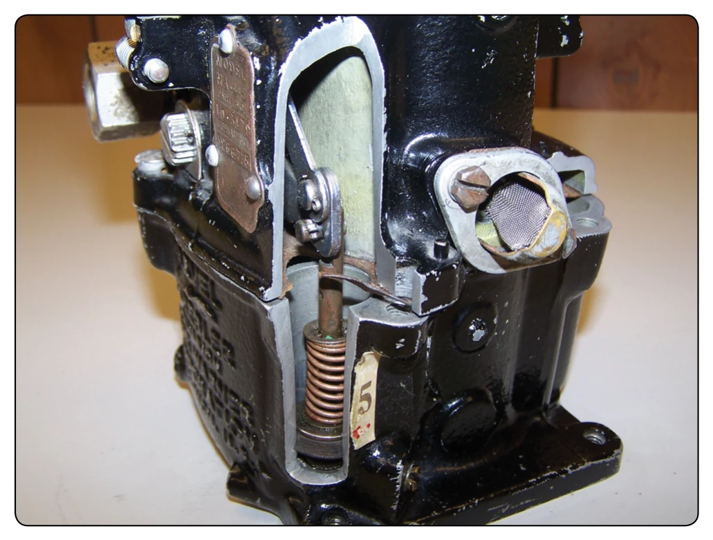 Accelerating pump shown in cutaway.