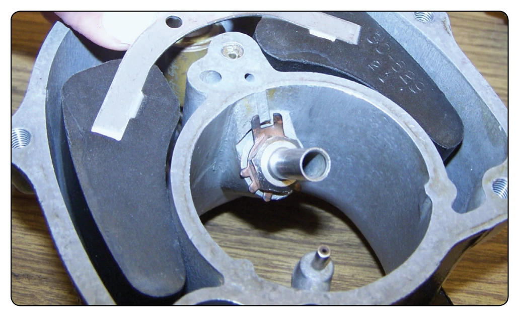 Float chamber discharge nozzle and float.