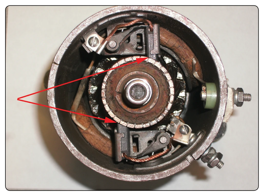 Wear areas of commutator and brushes.