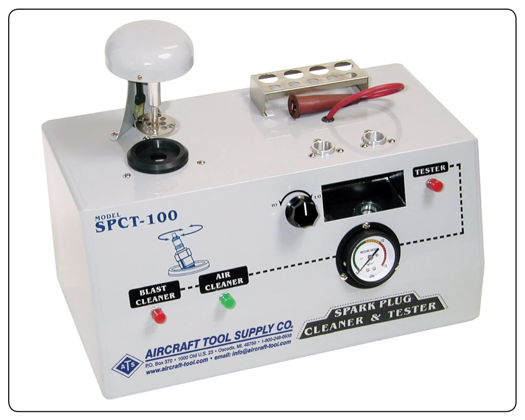 Spark plug cleaner tester.