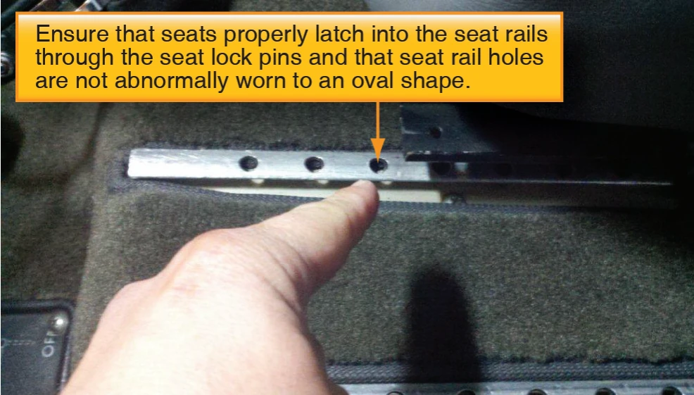 Figure 2-5. Seats should be inspected to ensure that they are properly latched into the seat rails and checked for damage.