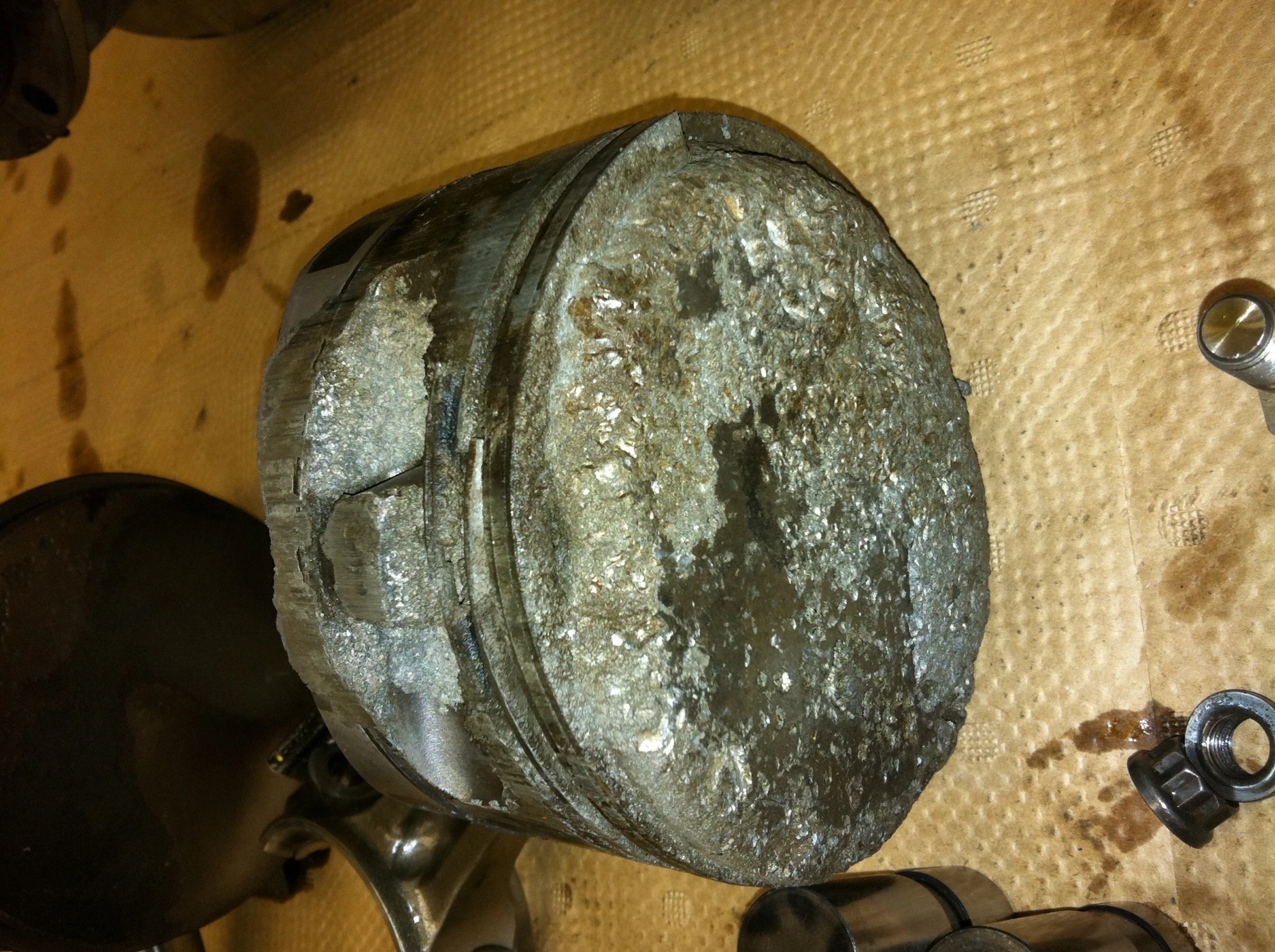Figure 2-9. An aircraft piston showing damage that occurred in just minutes as a result of detonation and overheating.