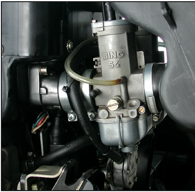 Figure 4-9. Typical 2-stroke carburetor.