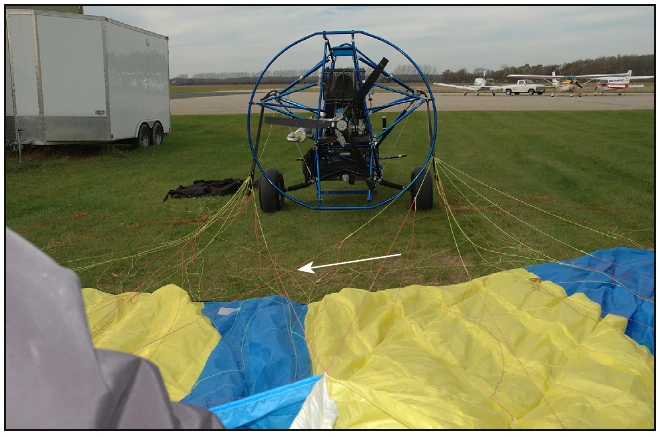 Figure 5-14. “X” in the suspension lines marks the exact center of the uninflated wing.