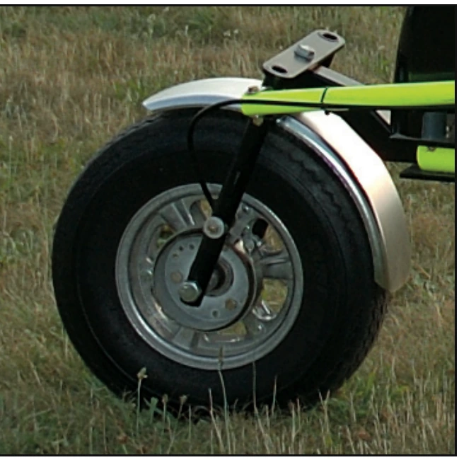 Figure 5-5. Check for proper tire inflation and that the axle bolt is secure.