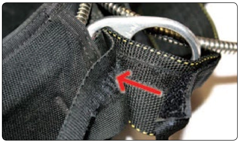 Figure 2-56. RSL Velcro riser damage.