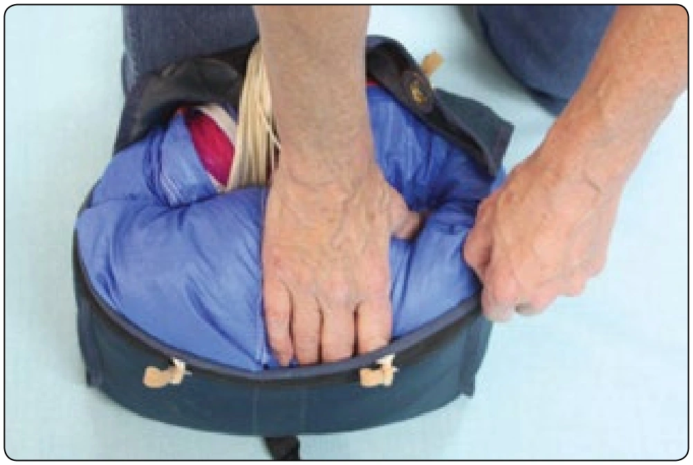 Figure 4-27. Shove the canopy down into the bag filling the corners.