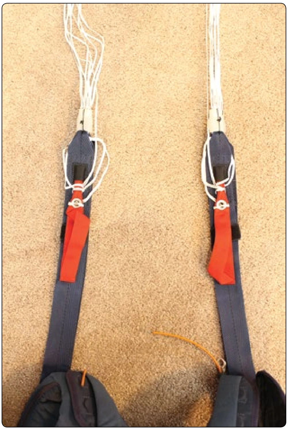 Figure 5-115. Set brakes. Excess lower control line is inserted through top of riser, around nose of toggle, and toggle placed in nose keeper.