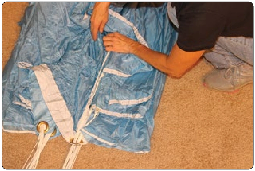 Figure 5-123. Pull the lines taught and to the center.