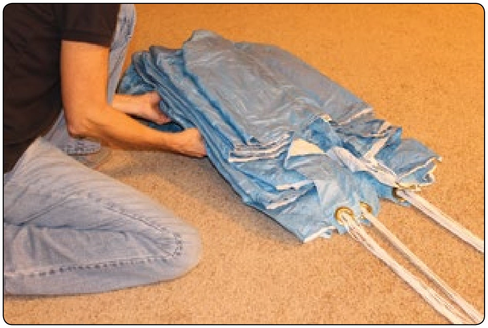 Figure 5-127. Narrow the pack job by folding the divided sections in half. The sections can be folded under or up.