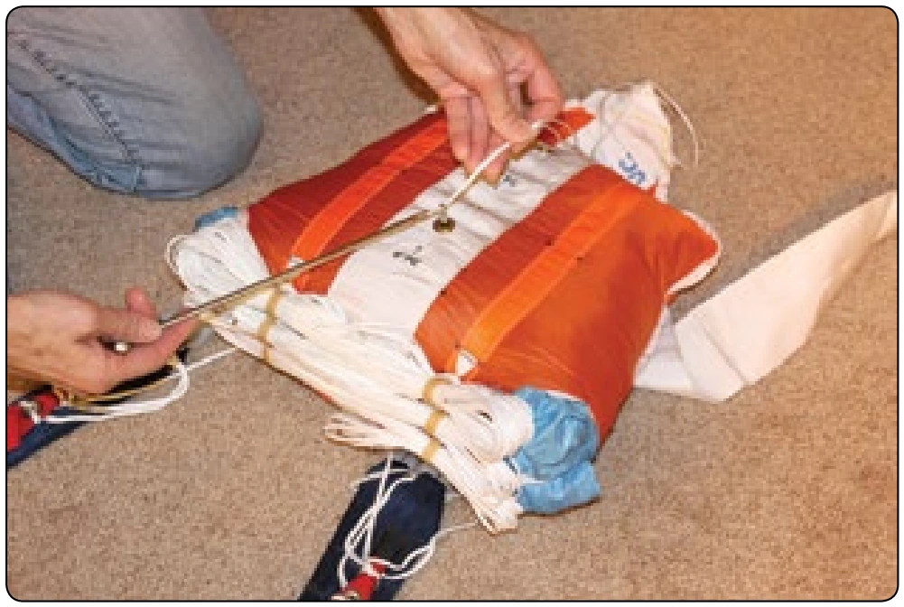 Figure 5-143. Pull a second bodkin through the bag using a pull up cord.