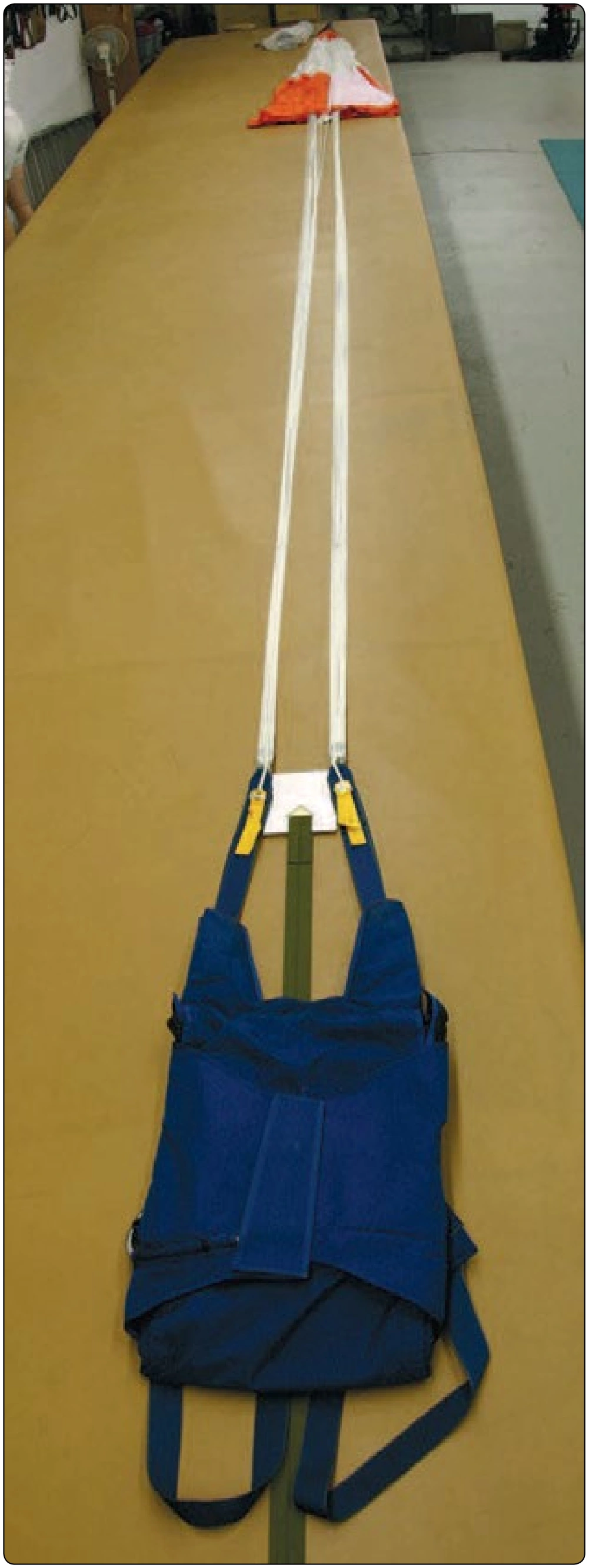 Figure 5-32. Round parachute assembly on packing table.