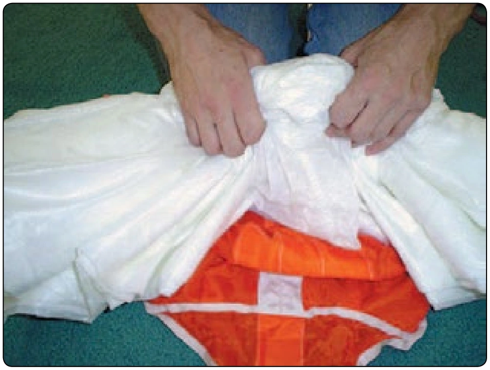 Figure 5-97. Split fabric and form “ears.”