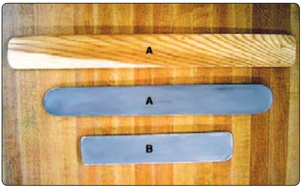 Figure 6-14. Packing paddles and packing fid.