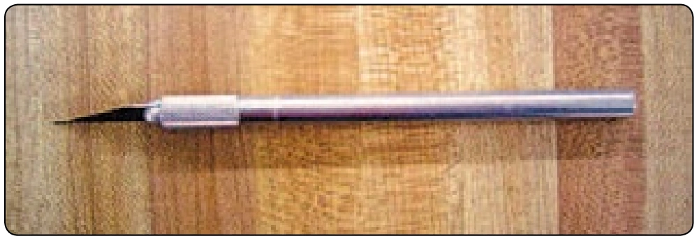 Figure 6-6. Scalpel or Exacto® knife.