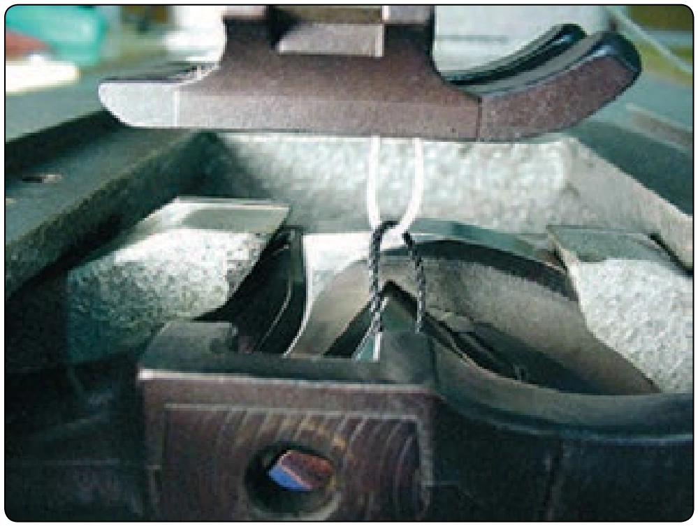 Figure 6-73. Fifth step in forming a stitch.