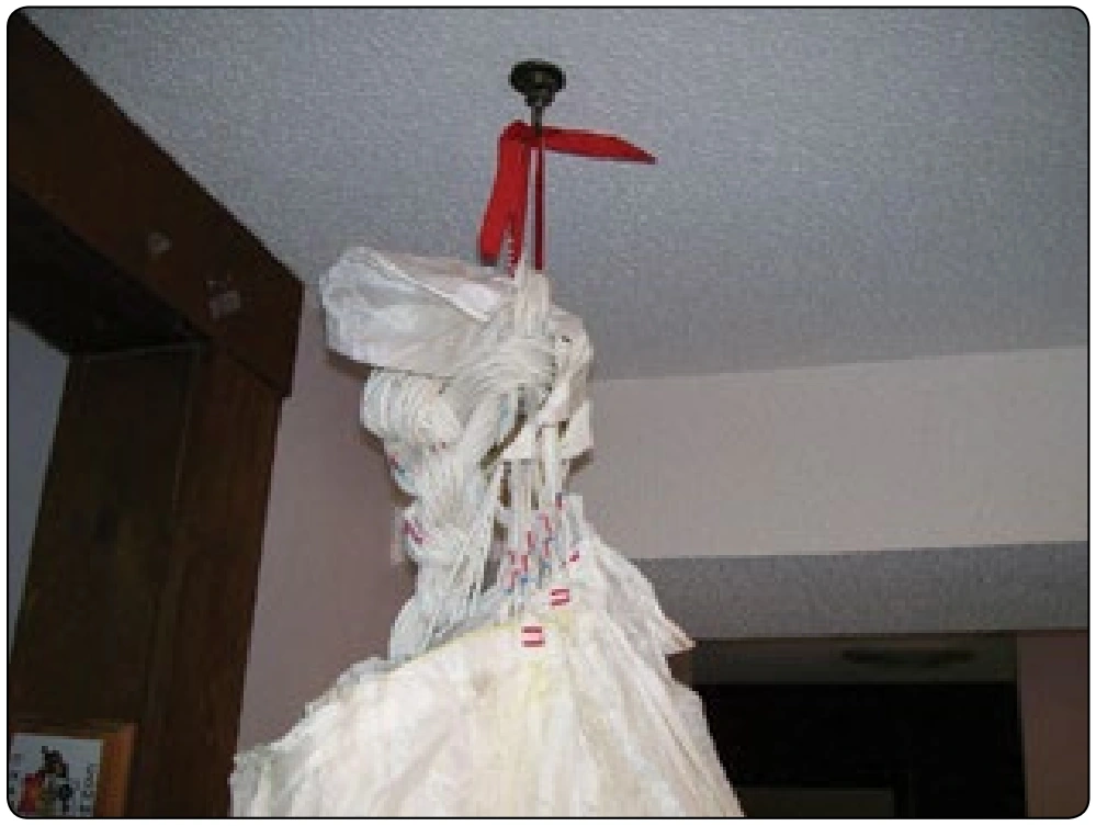 Figure 6-89. A square canopy can also be aired by S folding and hanging it from a simple hook.