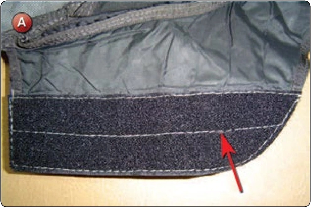 Container Velcro® Replacement, procedure photograph 2 (source page 7-44).
