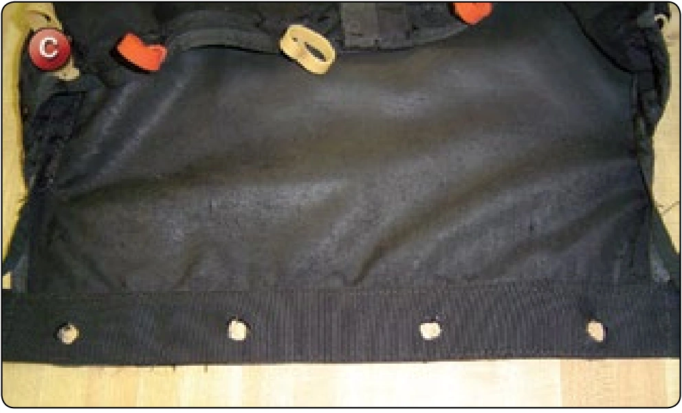 Main Deployment Bag Repair—Closing Flap Grommet Pullout, procedure photograph 3 (source page 7-72).