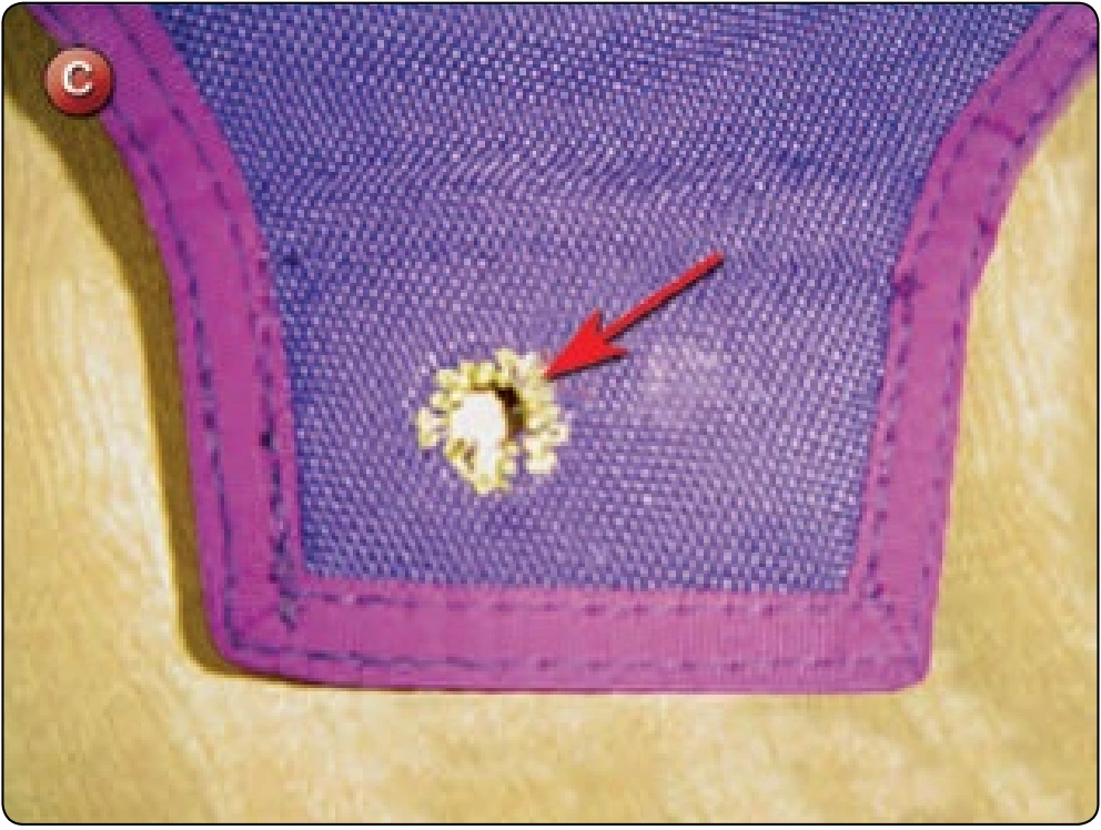 Material Repair and Grommet Replacement, procedure photograph 1 (source page 7-43).