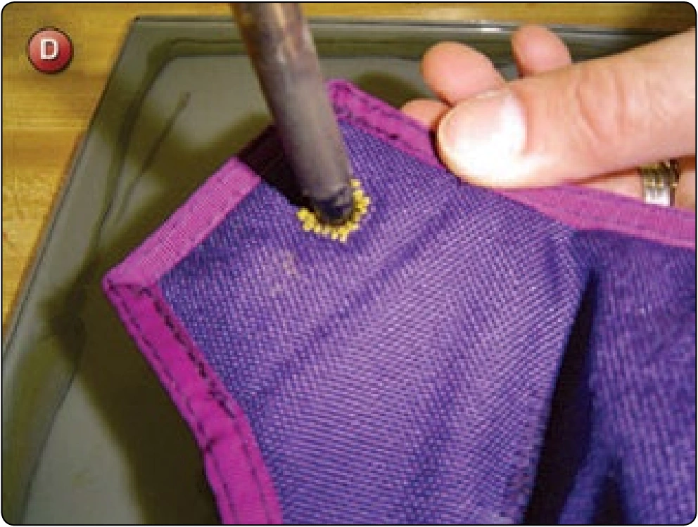Material Repair and Grommet Replacement, procedure photograph 2 (source page 7-43).