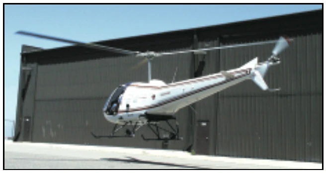 Figure 9-1. Exercise extreme caution when hovering near buildings or other aircraft.