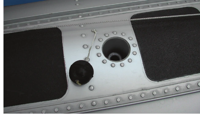 Figure 4-2. Bilge pump openings are closed with a soft rubber ball.