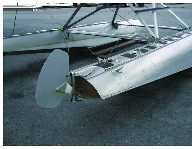 Figure 4-4. Inspect the water rudders, cables, springs, and pulleys for proper operation.